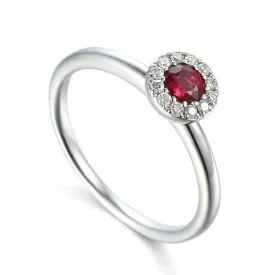 18ct White Gold 0.44ct Ruby And 0.10ct Diamond Halo Ring