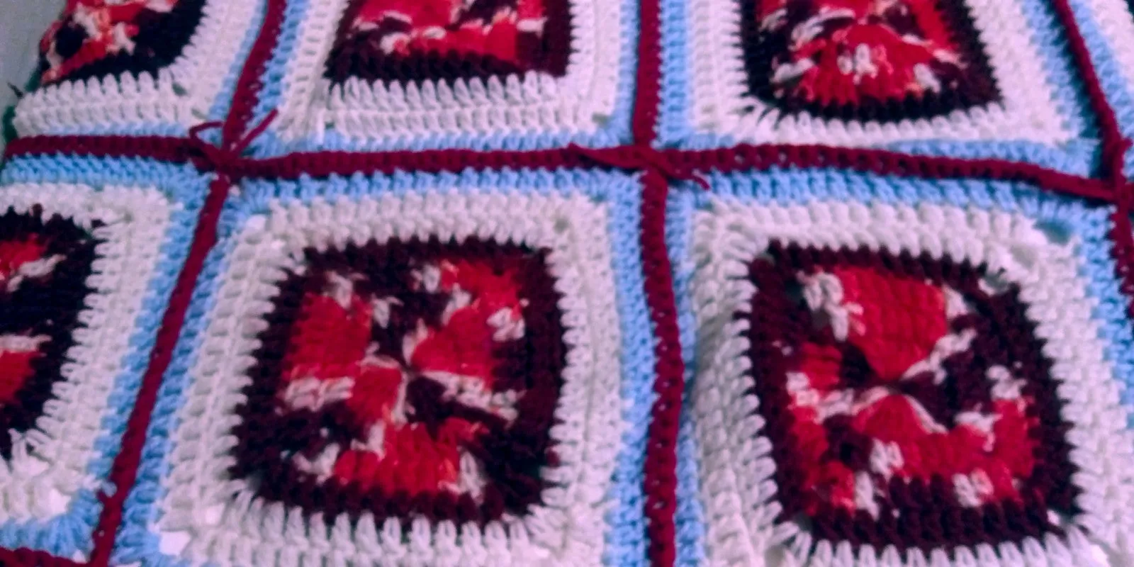 Handmade Granny Square hand crochet of Red, Whites, Light Blue and Red Border Baby Blanket